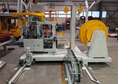 Automatic strapping, labelling and weighing system for coils